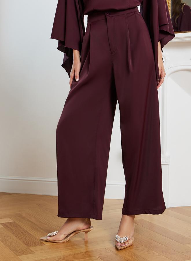 ستايلي طقم منسق من بنطال بأرجل واسعة وبلوزة منمقة - Image 4